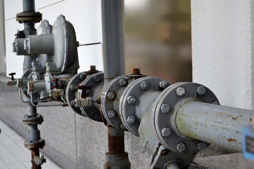 Industrial water pipe system with valves and fittings, representing plumbing infrastructure relevant to Frost & Kretsch Plumbing Inc. services in Eastpointe, MI.