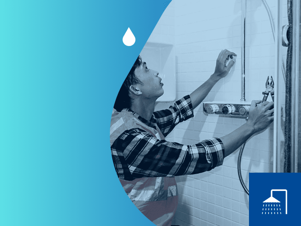 Plumber working on shower installation, showcasing expertise in plumbing services for Frost & Kretsch Plumbing Inc in Armada.